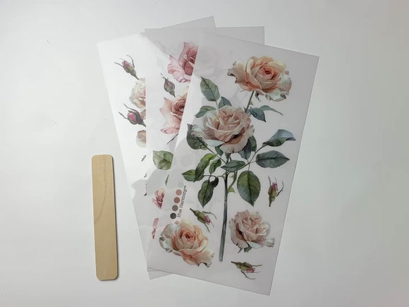 A 14 second video shows a close-up and backside of 3 sheets of ReDesign with Prima's Blush Symphony small rub-on transfers against a white background.