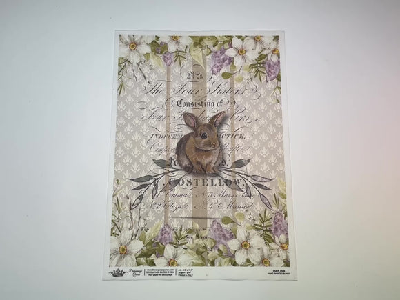 A 12 second video shows a close-up and backside of Decoupage Queen's Hand Painted Bunny A4 rice paper against a white background.