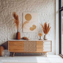 A mid-century TV consol or dresser is painted partially white with natural wood and features ReDesign with Prima's Braided Bliss A1 fiber paper on the front center between its drawers.
