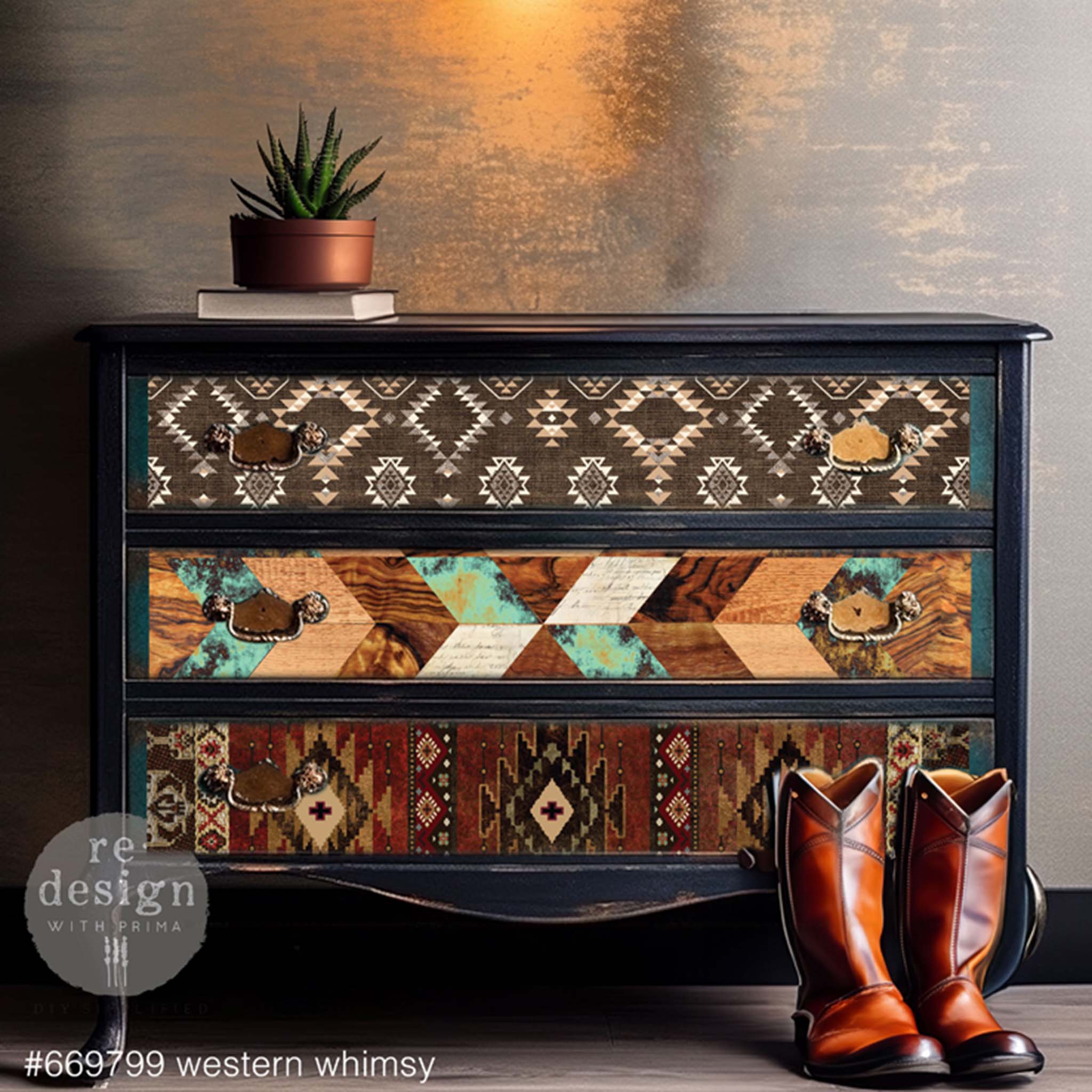 A vintage 3-drawer dresser is painted dark blue and features ReDesign with Prima's Western Whimsy tissue paper on the drawers.
