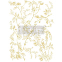 Rub-on transfer design that features gold foil vine-like branches with birds and flowers on it is on a white background.