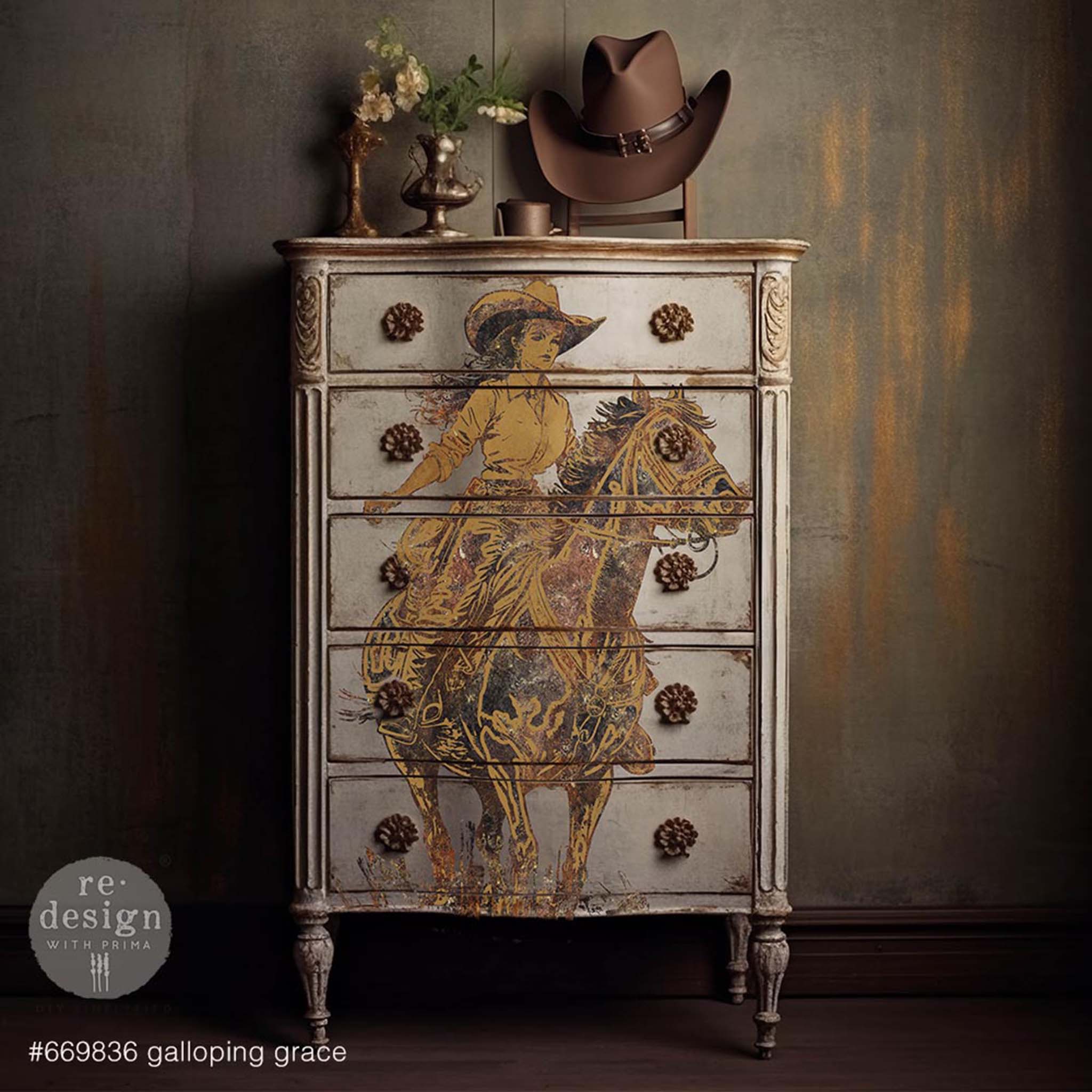 A vintage 5-drawer chest dresser is painted gray and features ReDesign with Prima's Galloping Grace transfer down the center of its drawers.