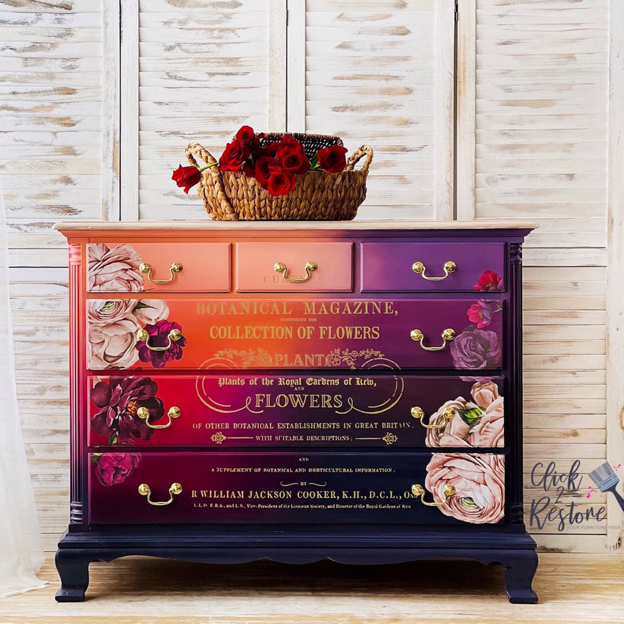 A vintage 6-drawer dresser refurbished by Click 2 Restore is painted a diagonal ombre of light orange, purple, to dark blue and features ReDesign with Prima's Lush Florals 2 transfer on the drawers.