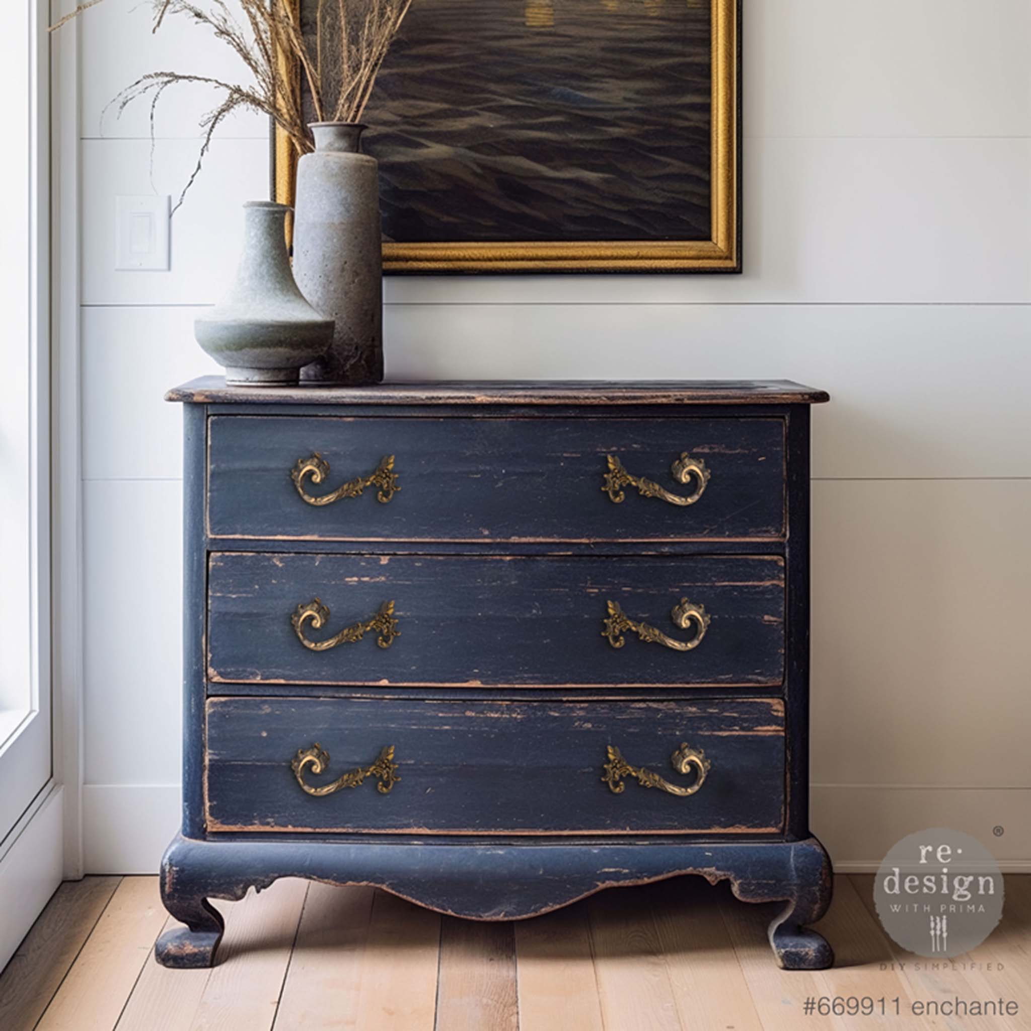 A vintage 3-drawer dresser is painted a weathered blue and features ReDesign with Prima's Enchante metal drawer pulls by Kacha.