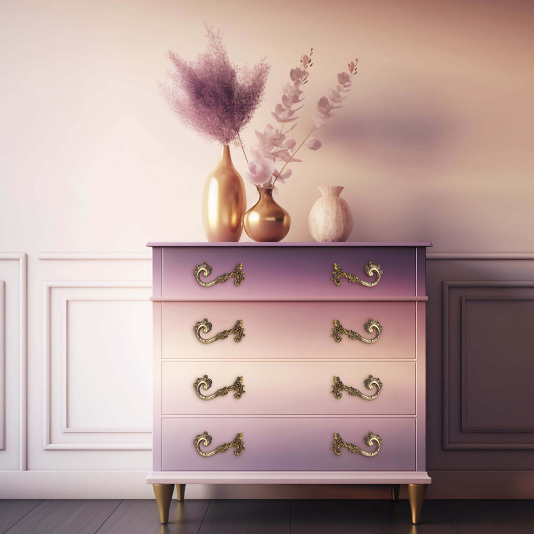 A 4-drawer dresser is painted an ombre of light purple and pinks and features ReDesign with Prima's Enchante metal drawer pulls by Kacha.