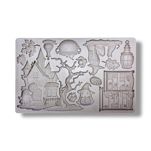 Decorative silicone mold with Halloween-themed designs on a white background