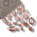 Silicone mold with decorative elements on a white background.