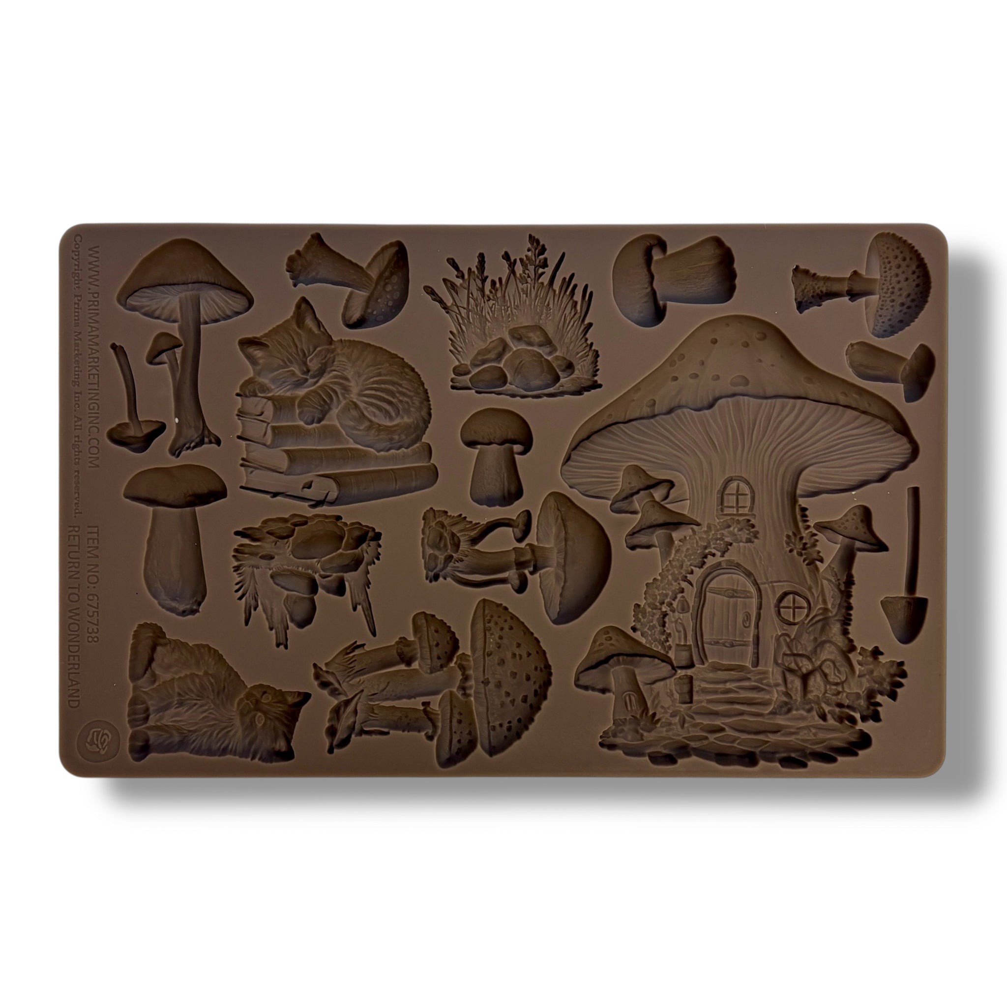 A brown silicone mold of mushrooms, a fairy mushroom house, and cats is against a white background. 