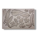 Silicone mold with leaf patterns on a white background