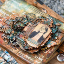 Decorative book with vintage-style embellishments and a portrait inside.