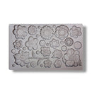 Silicone mold with floral designs on a white background