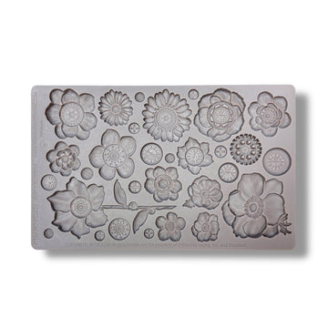 Silicone mold with floral designs on a white background