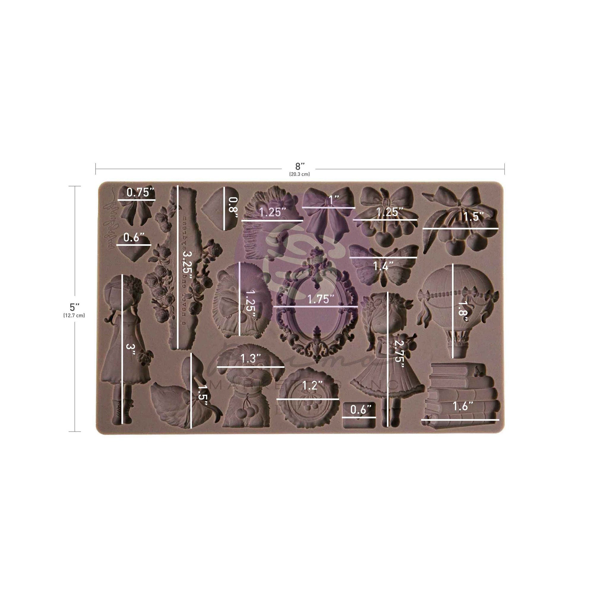 Silicone mold with various shapes and measurements on a white background