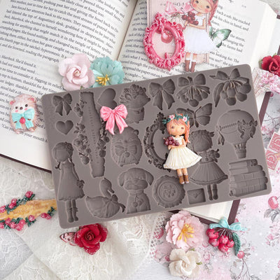 Silicone mold with decorative elements on a floral background