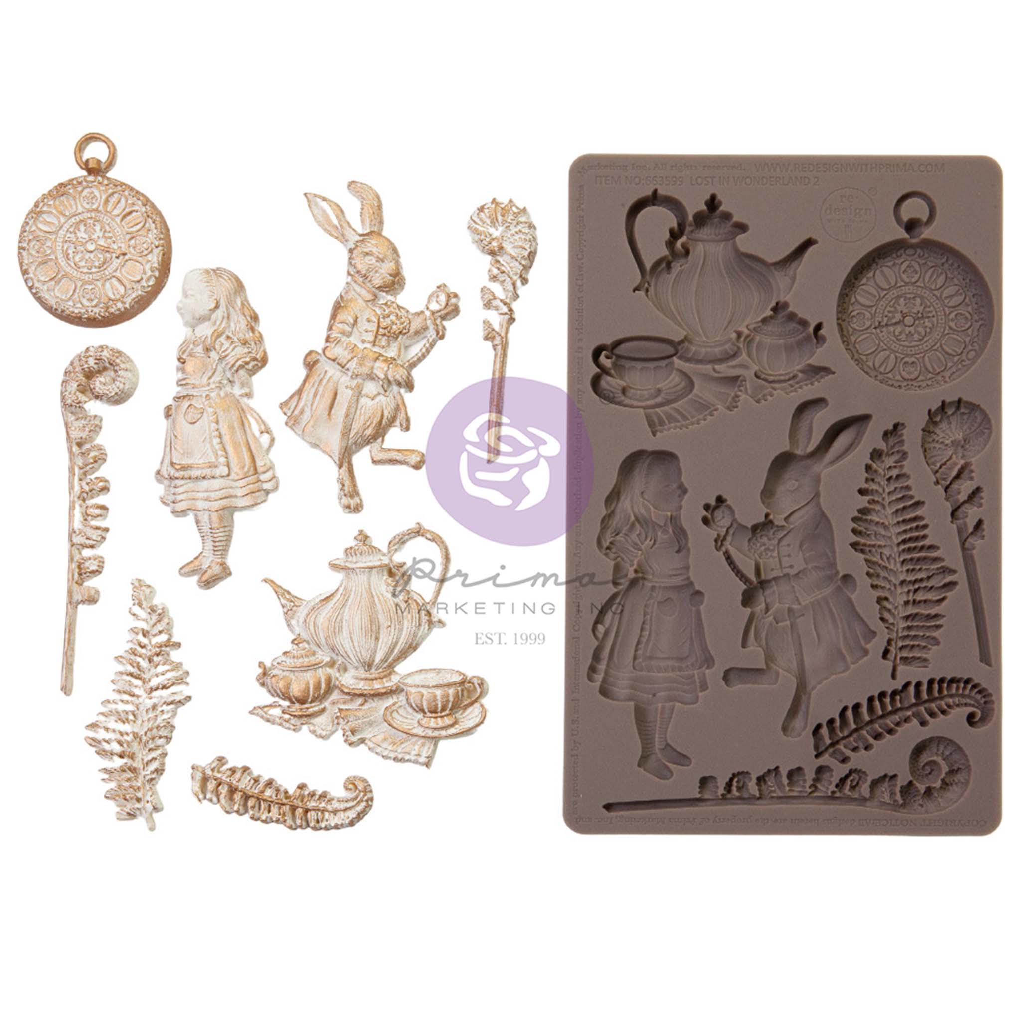 Gold and white colored silicone mold castings and a brown silicone mold of Prima's Marketing's Following Alice are against a white background. This mold features Alice, the White Rabbit, a tea set, pocket watch, and fern.