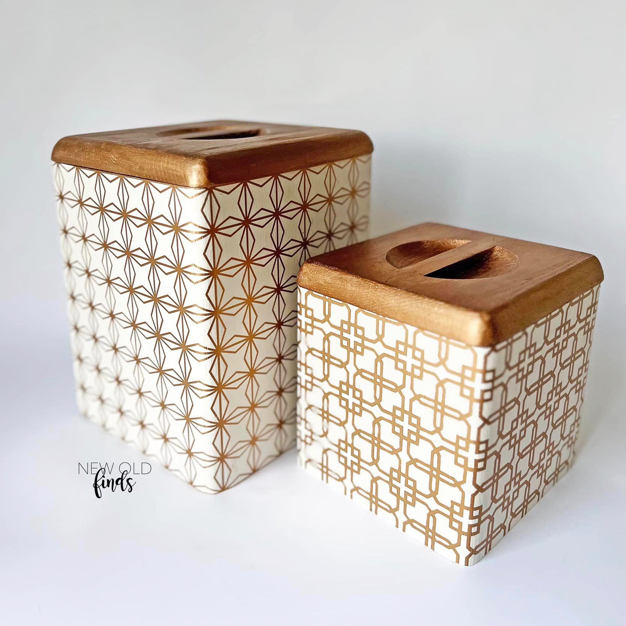 Two counter-top dry storage containers refurbished by New Old Finds are painted white with natural wood lids and features ReDesign with Prima's Motif Geometrique small transfer on them.