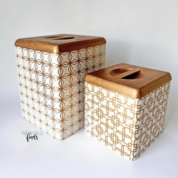 Two counter-top dry storage containers refurbished by New Old Finds are painted white with natural wood lids and features ReDesign with Prima's Motif Geometrique small transfer on them.