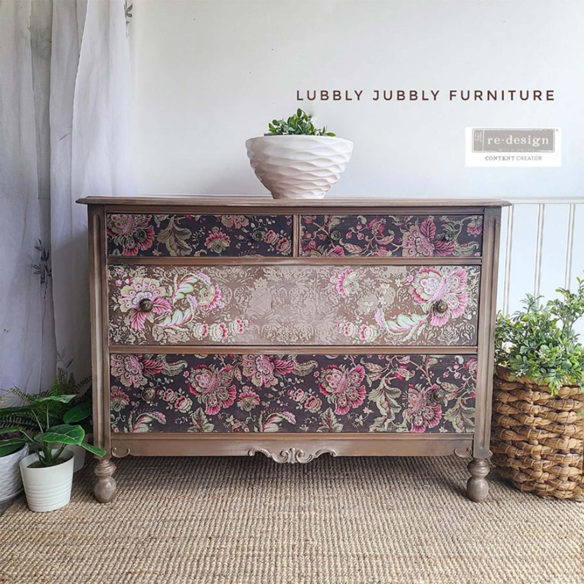 A brown 5-drawer dresser repurposed by Lubbly Jubbly Furniture, A ReDesign Ambasador, features Floral Paisley on its drawers. 