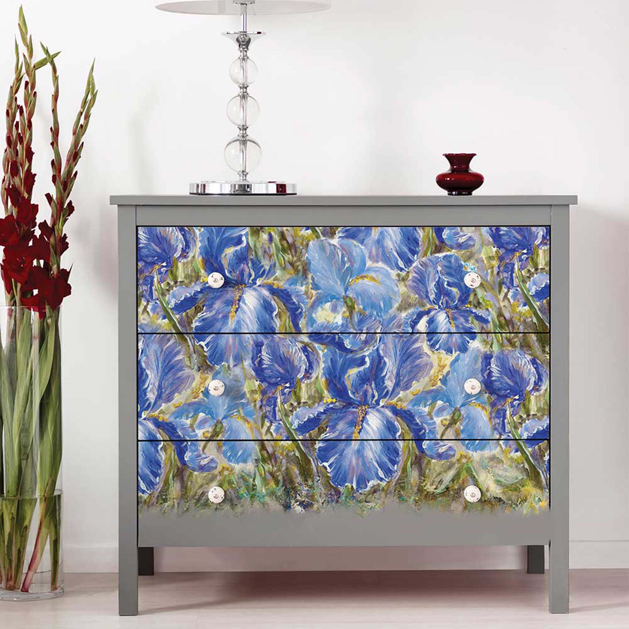 A 3-drawer dresser is painted medium grey and features ReDesign with Prima's Enchanted Iris rice paper on the drawers.