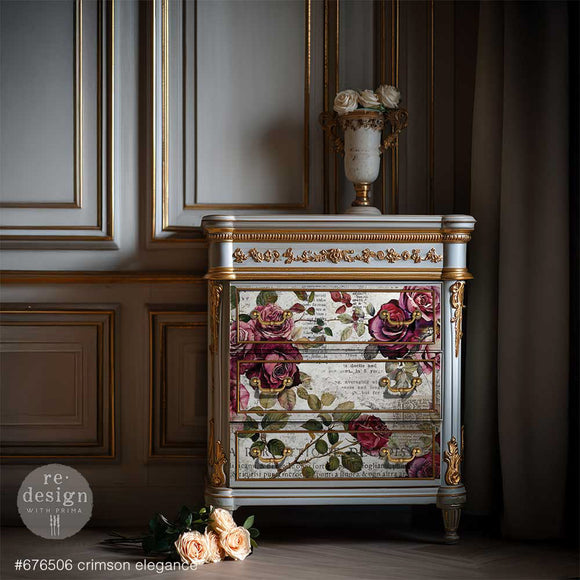 Crimson Elegance decoupage paper used on an ornate painted cabinet with gold accents and floral drawer fronts