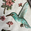 Close-up of painted hummingbird and floral castings made with ReDesign with Prima Bloom & Flutter silicone mold