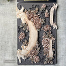 Finished gold Bloom of Eternity rose banner and floral castings made from ReDesign with Prima silicone decor mold