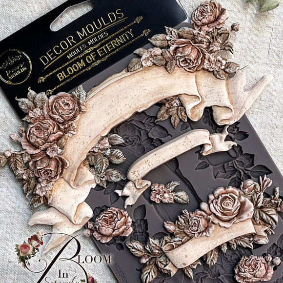 Close-up of Bloom of Eternity rose banner silicone mold with vintage clay castings for shabby chic furniture decor