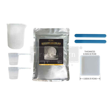 Packaging of Redesign Casting Mix with measuring cups and thickness measurement details on a white background