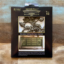 A package of ReDesign with Prima's Lush Reverie Left Decor Poly bendable casting is against a wood background.