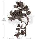 A flexible decor poly casting featuring a thorned branch of 2 roses with leaves facing right is against a white background. Measurements for the casting read: 10.5" (26.6 cm) by 7" (17.7 cm).