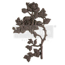 A flexible decor poly casting featuring a thorned branch of 2 roses with leaves facing right is against a white background. 