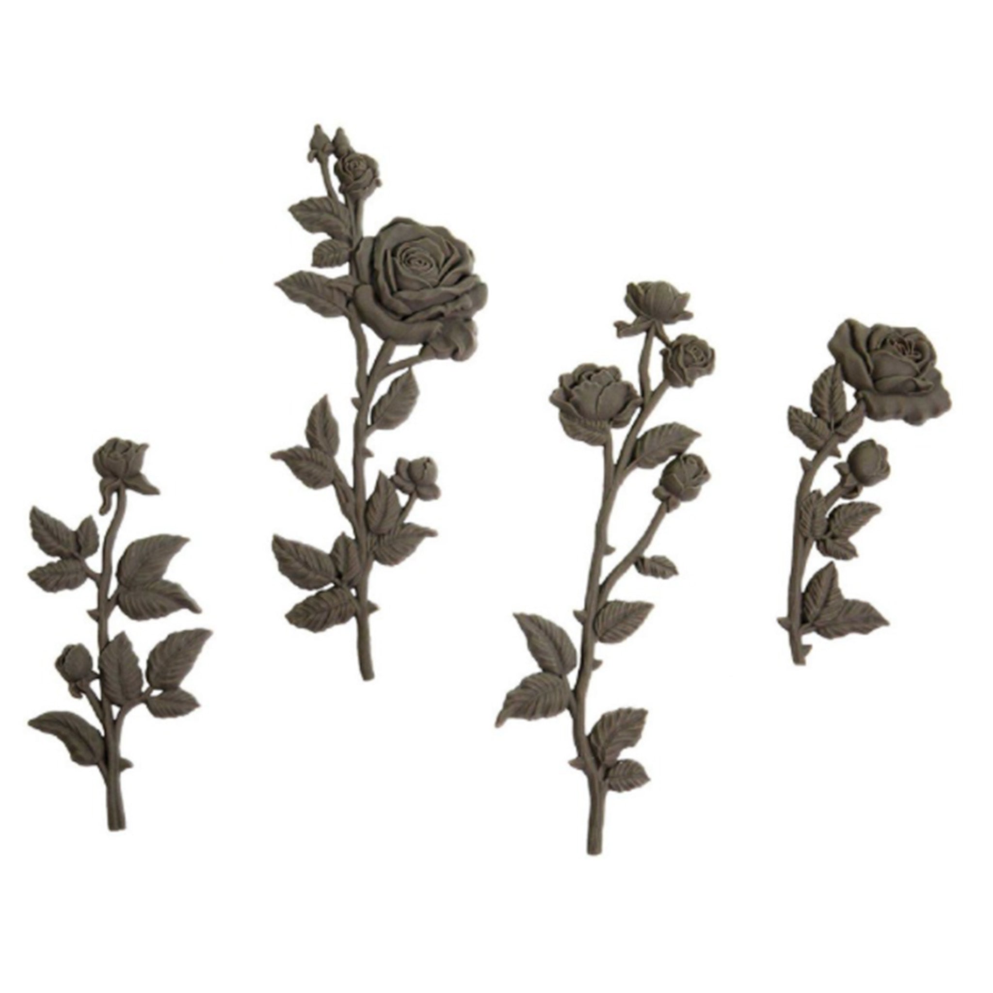 Four brown colored bendable furniture appliques of single stem roses are against a white background. 