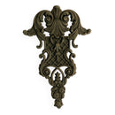 A bendable furniture applique that features intricate flourishes, a lattice center, and floral accents is against a white background.