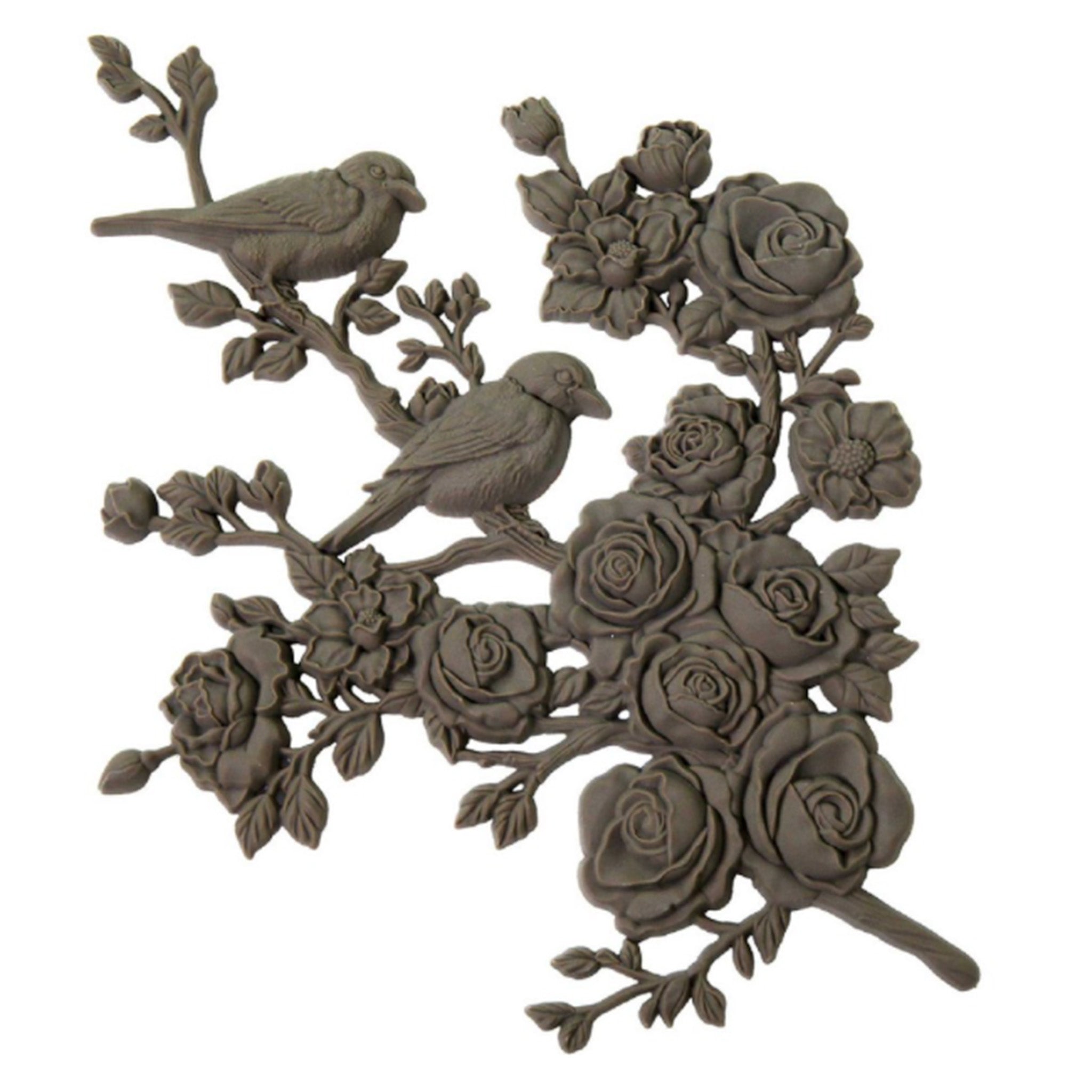 A brown colored bendable furniture applique of 2 birds perched on a branch of blooming roses and flowers is against a white background.