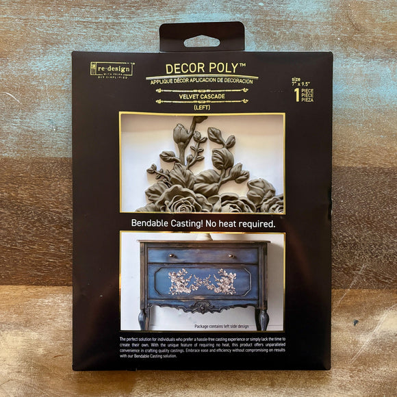 A package of ReDesign with Prima's Velvet Cascade Left Decor Poly bendable casting is against a wood background.