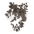 A flexible decor poly casting featuring 3 roses with hanging branches curving to the right is against a white background. 