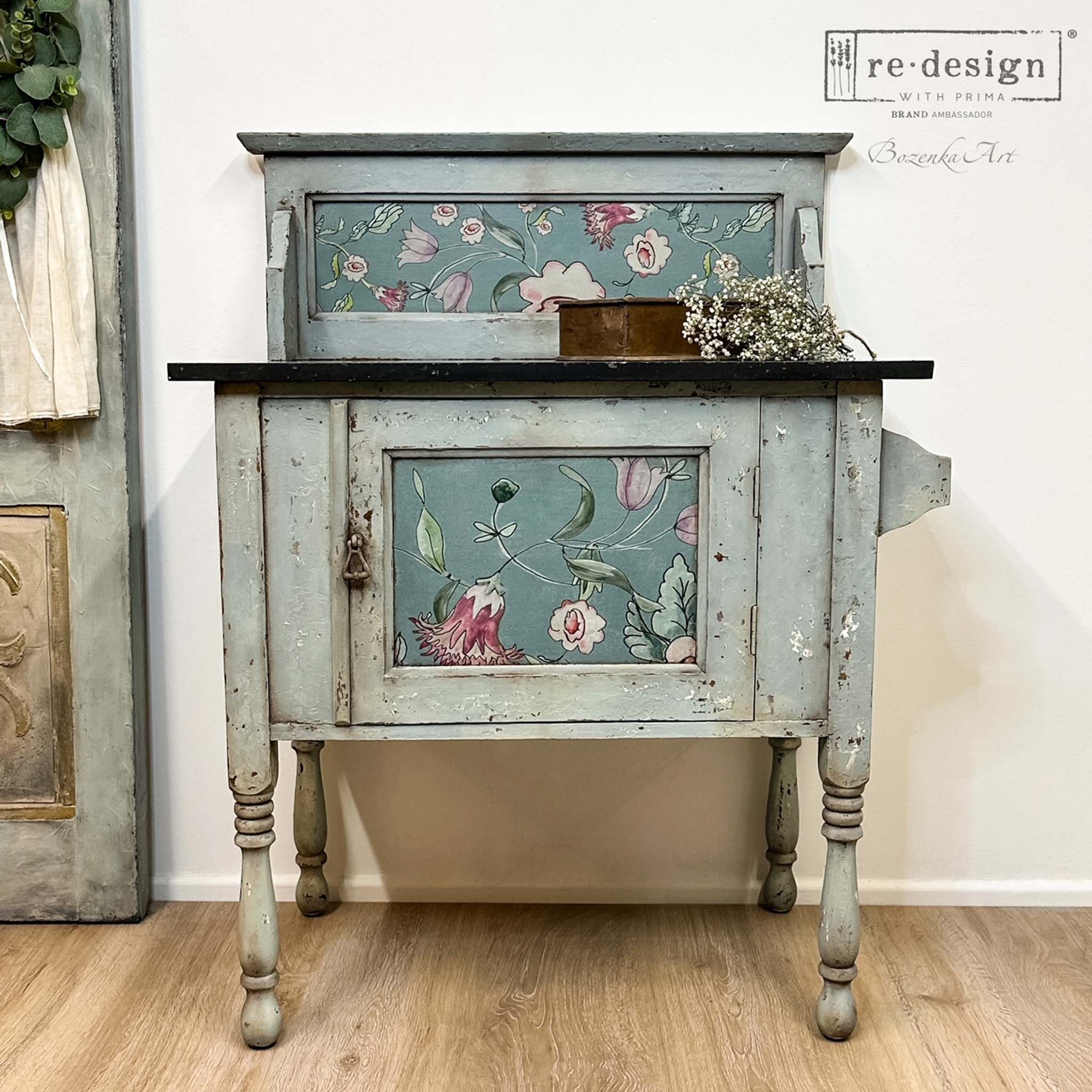 A vintage bar cart table refurbished by Bozenka Art is painted light gray and features ReDesign with Prima's Swedish Posy A1 Fiber Paper by Annie Sloan on it.