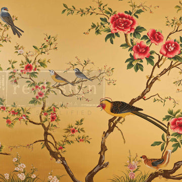 Close-up of ReDesign with Prima Radiant Flight A3 fiber decoupage paper with colorful birds, pink flowers, and a warm gold background