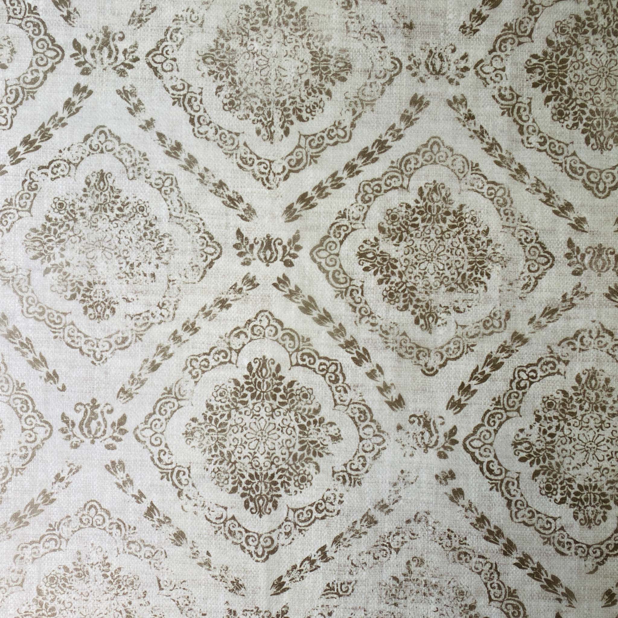 Close-up of a tissue paper design that features a repeating floral diamond pattern against a soft grey background.