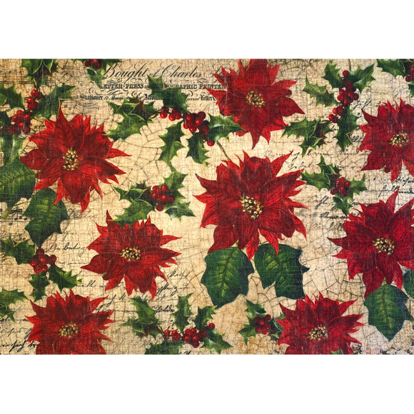 One sheet of an A3 fiber paper featuring holly berries and large red poinsettias against vintage parchment is against a white background.