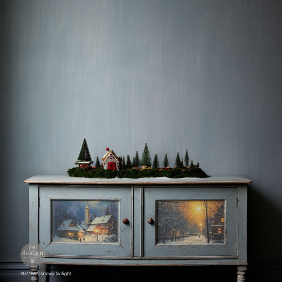 A vintage console table is painted light grey and features ReDesign with Prima's Snowy Twilight fiber paper on its 2 door inlays.