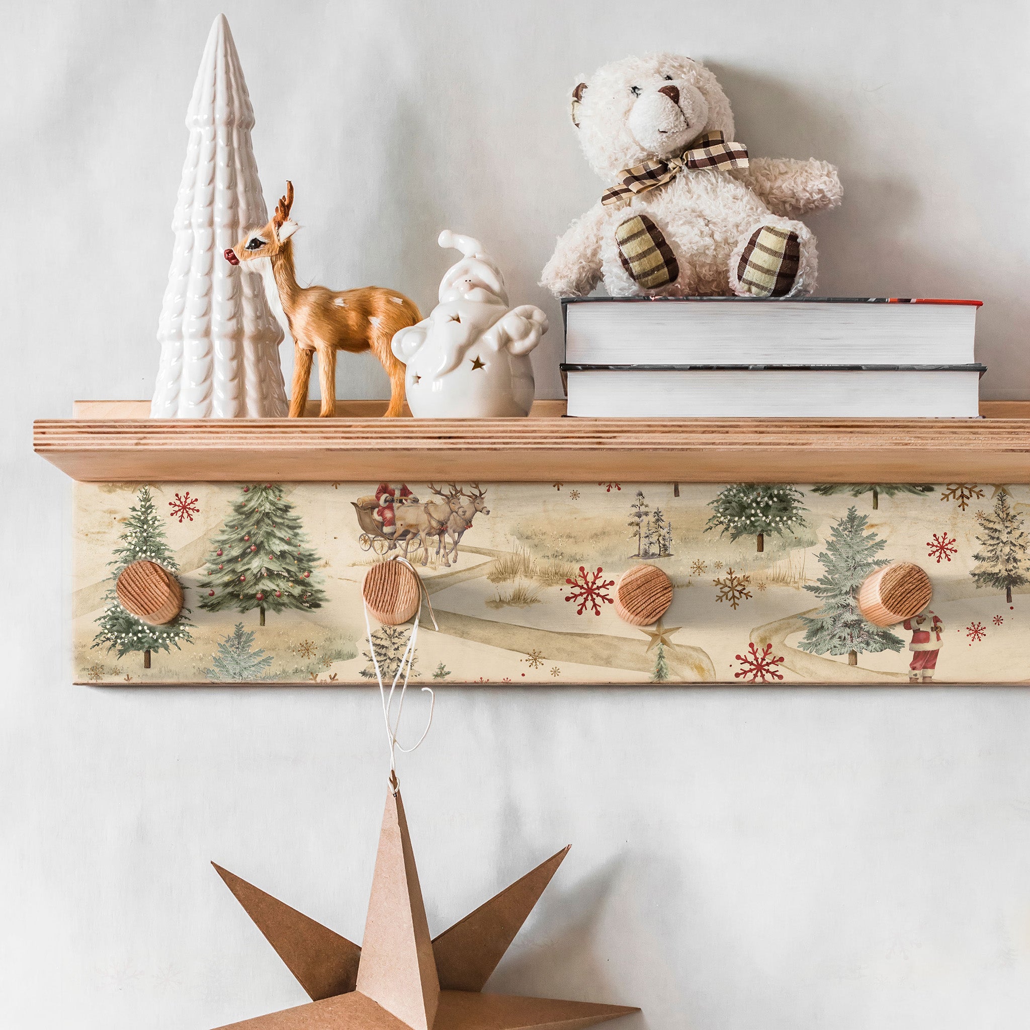 A wood coat rack features one of ReDesign with Prima's Whimsical Woodland fiber papers on it.