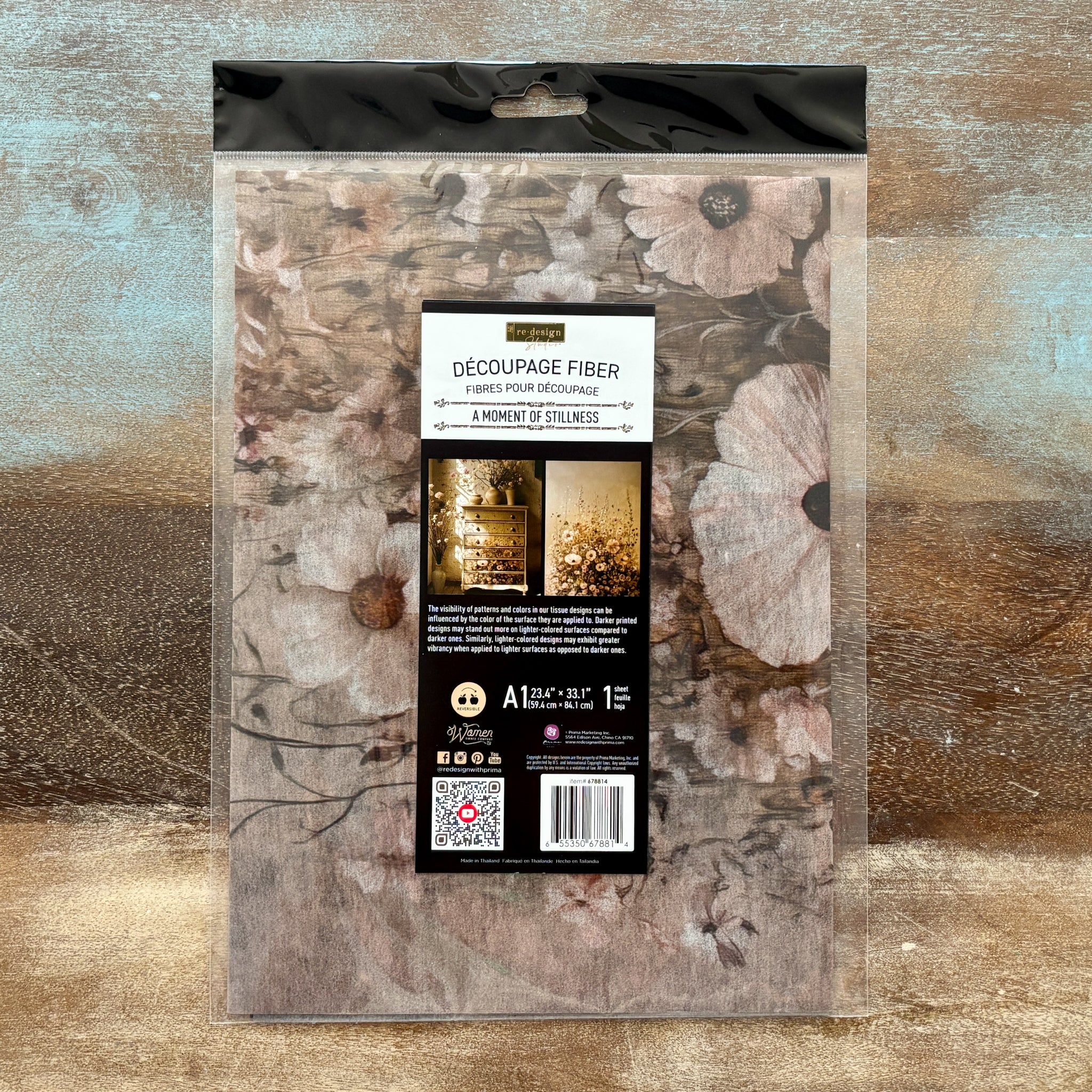 Packaging of decoupage fiber with floral design on a textured background