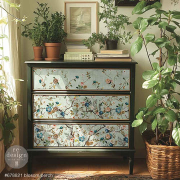 A 3-drawer chest dresser is painted black-brown and features ReDesign with Prima's Blossom Perch A1 fiber paper on the drawers.