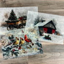 Three sheets of A3 fiber paper each with their own designs featuring a wagon hauling a Christmas tree and gifts, vibrant cardinals perched on a frosty branch, and a cozy barn nestled in a winter wonderland.