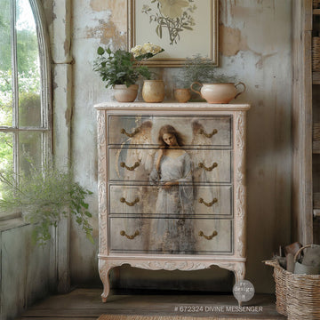 A vintage 4-drawer chest dresser is painted soft white and features ReDesign with Prima's Divine Messenger A1fiber paper on the drawers.