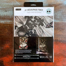 A package of ReDesign with Prima's Enigmatic Realm A1 fiber paper is against a dark wood background.