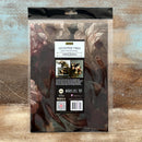 Packaged decoupage fiber on a textured wooden surface