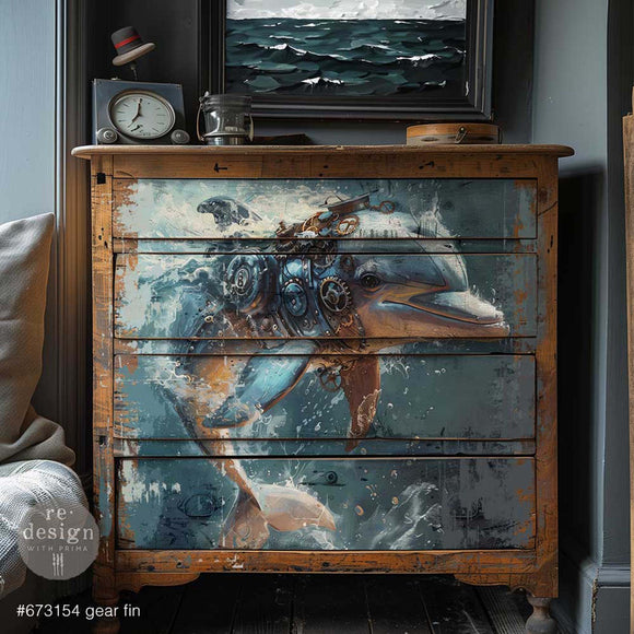 A 4-drawer natural wood dresser features ReDesign with Prima's Gear Fin A1 fiber paper on the front.