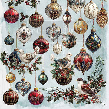 Decorative Christmas ornaments with birds and holly on a light blue background